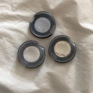 Blue, white, and yellow eyeshadow from body shop